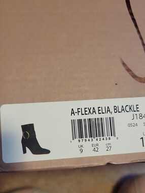 Franco Sarto Black Ankle Boot with Gold Ring Accent
